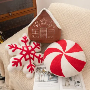 Christmas plush throw pillow set featuring cute gingerbread house snowflake and peppermint candy designs.