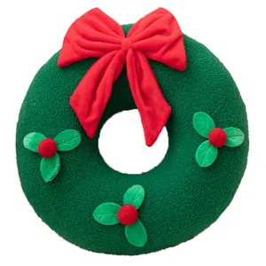Christmas plush wreath pillow with red bow, soft stuffed holiday home decor for festival party.