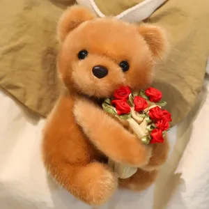 Mignon petit ours en peluche marron tenant un bouquet de roses rouges cadeau pour fille