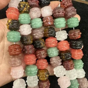 Detailed view of natural stone drum-shaped beads in various colors for DIY jewelry making