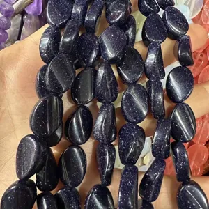 Macro di perline ovali in pietra di sabbia blu scintillante per gioielli fai da te