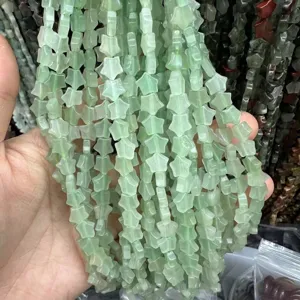 Close-up of 8mm green star-shaped aventurine stone loose beads for DIY jewelry