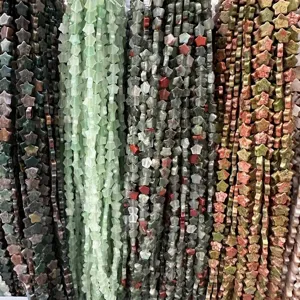Close-up of star-shaped natural stone beads strands for DIY jewelry making
