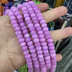 Close-up of 5x8mm faceted natural purple stone abacus beads for DIY jewelry