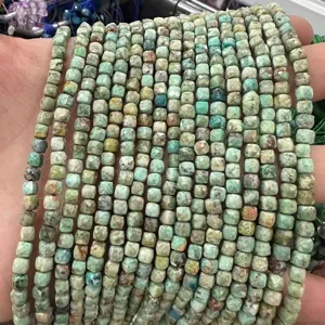 Faceted natural green stone 6mm cube beads for DIY jewelry craft, macro detail shot