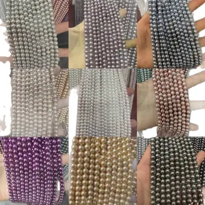 Assortiment de perles de coquillage colorées pour la création de bijoux artisanaux