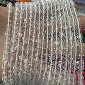 Detailed macro view of 6mm transparent faceted cubic crystal beads for DIY jewelry making