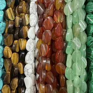 Assortimento di perle ovali in pietre naturali per la creazione di gioielli fai da te