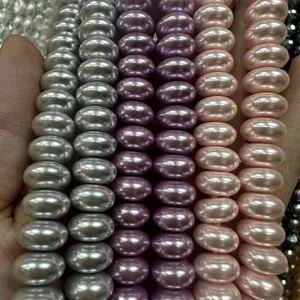 Close-up of 6x10mm imitation pearl abacus beads in assorted colors for DIY jewelry
