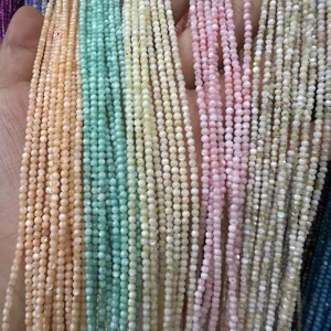 2mm colorful round shell beads for DIY jewelry making in various pastel shades.