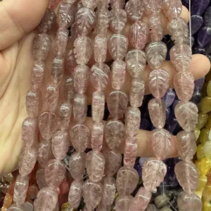 Macro view of natural strawberry quartz leaf beads for DIY jewelry
