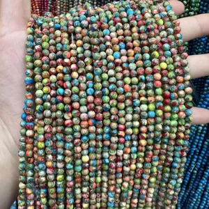 Macro view of colorful Imperial Jasper round beads for DIY jewelry making accessories