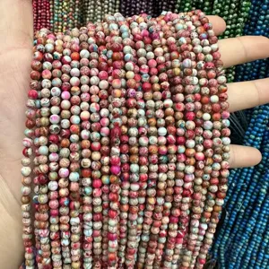 Close-up of high quality colorful imperial sea sediment jasper beads strands for DIY jewelry