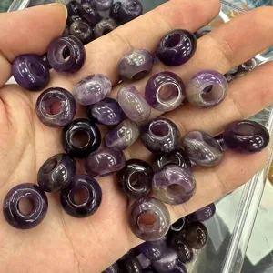 Detailed view of natural purple amethyst abacus beads with large holes for DIY jewelry making.