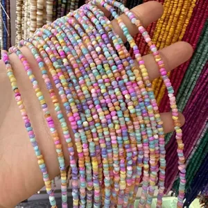Macro view of colorful 3mm natural shell spacer beads for DIY jewelry making crafts