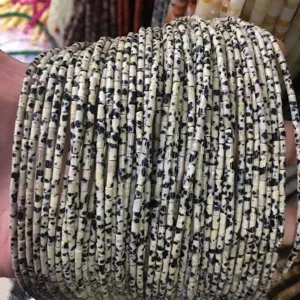 Detail of 2x4mm natural dalmatian jasper tube beads for DIY jewelry making