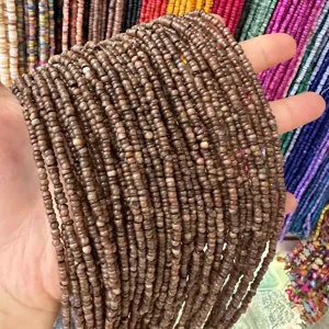 Close-up detail of 3mm natural brown shell heishi beads for DIY jewelry making