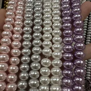Close-up macro shot of high-luster multicolored imitation pearl abacus beads for DIY crafts