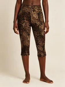 Detailed shot of women's leopard print casual shorts, highlighting digital print and stretch fabric.