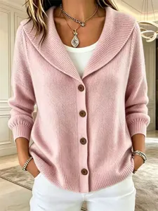 Chic pink knit cardigan with lapel collar, button front closure, and elegant design.