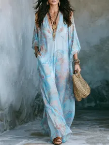 Light blue digital floral print boho maxi dress with V-neck and flowing silhouette.