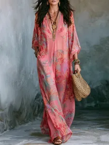 Boho floral print maxi dress for women, elegant v-neck long sleeve bohemian resort wear.