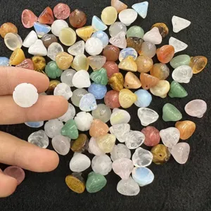 Detailed macro view of mixed colorful 12mm lotus seed gemstone beads for DIY crafts