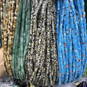 Detailed close-up view of 3x3mm multi-color square natural stone cube beads for DIY