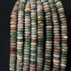 Close-up of 4x10mm mixed natural gemstone spacer beads for DIY jewelry making