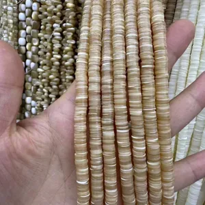 Gros plan de perles intercalaires en coquillage naturel de 6 mm pour la création de bijoux