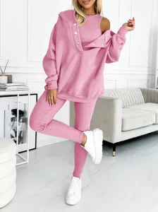 Detailed view of the stylish pink 3-piece ribbed sportswear set featuring cozy hoodie.