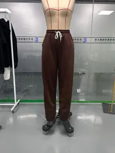 Women's high waist casual sweatpants with drawstring and cuffed ankles, solid brown color.