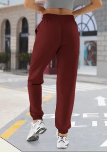 Women's high-waisted casual sweatpants with pockets, comfortable jogger design for daily wear.