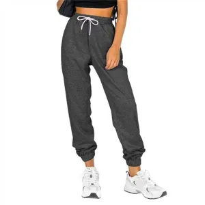 Detailed view of dark grey high-waist drawstring sweatpants with cuffed hems for casual wear.