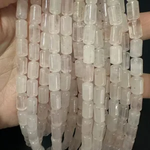 Close-up detail of natural quartz crystal cylinder beads for DIY jewelry making