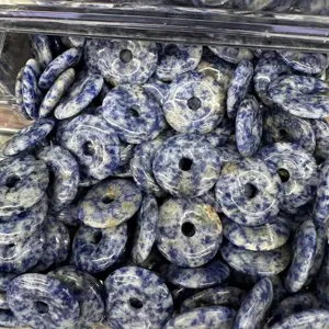 Bulk pile of natural blue sodalite 25mm donut beads for DIY crystal jewelry