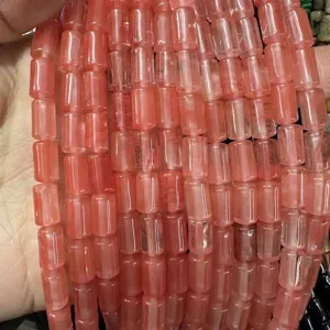Close-up of pink quartz cylinder beads for DIY jewelry making
