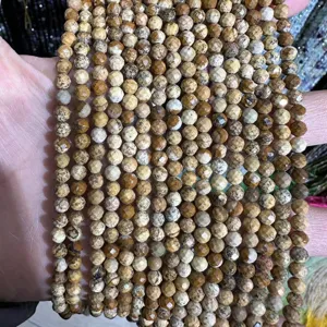 Close-up of multiple strands of faceted natural jasper beads for DIY jewelry making