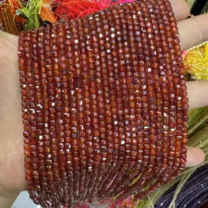 Close-up of faceted square brown zircon beads for DIY jewelry making accessories