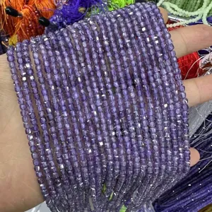 Close-up view of purple faceted square cubic zirconia loose beads for jewelry design