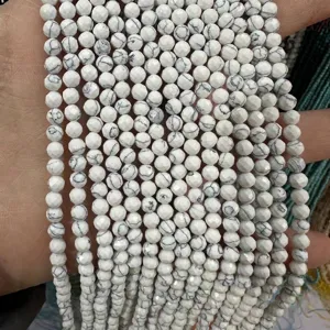 Macro view of faceted white howlite stone beads for handmade DIY jewelry making projects