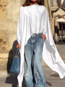 Top lungo ampio monocolor con orlo irregolare da donna moda casual quotidiana chic.
