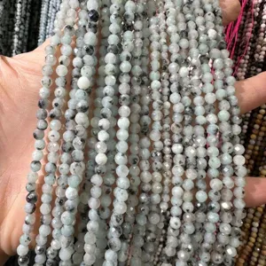 Macro view of light green faceted natural stone beads for DIY jewelry making accessories