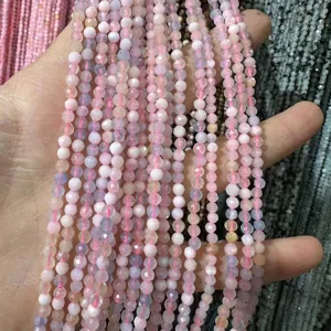 Macro view of pink and lilac faceted natural stone beads strands for DIY jewelry making