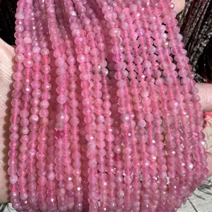 Close-up detail view of faceted pink natural stone crystal beads for DIY jewelry