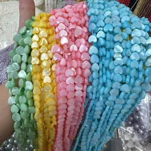 Strands of colorful heart-shaped mother of pearl shell beads for DIY jewelry making