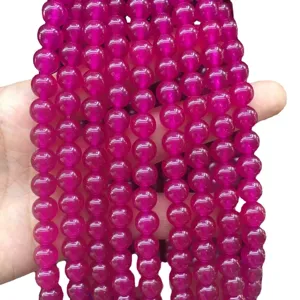 Bright magenta chalcedony round loose beads for DIY handmade jewelry making necklaces and crafts.