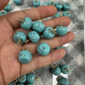 Detailed view of turquoise style apple pendants for DIY jewelry making accessories
