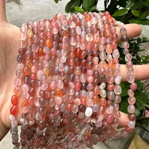Close-up of irregular natural stone beads in assorted colors for DIY jewelry making