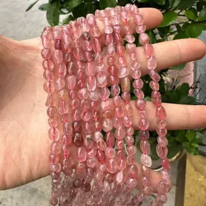 Detailed view of irregular 4*6mm natural strawberry quartz beads for DIY jewelry making